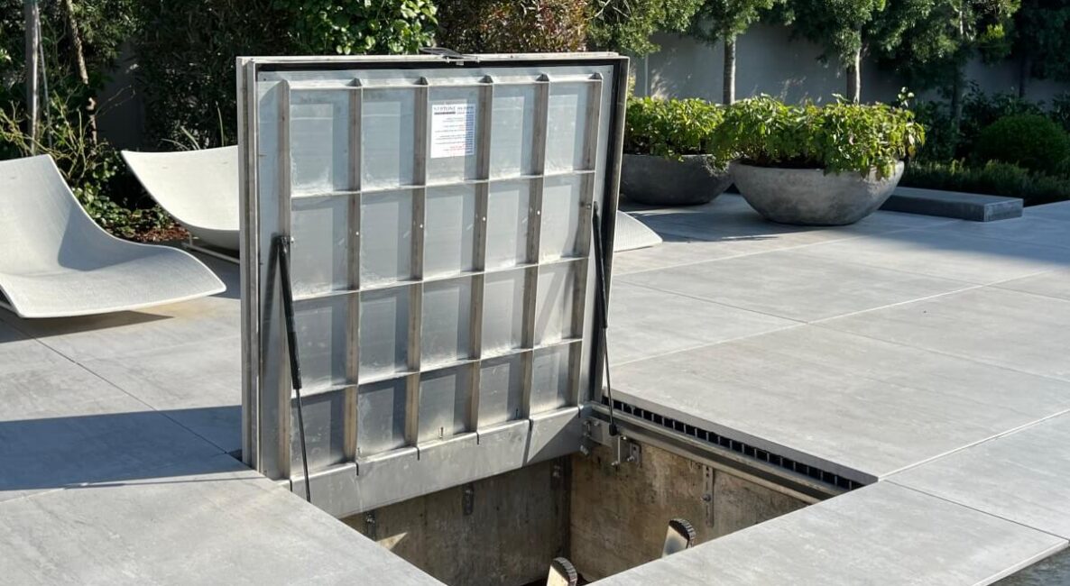 מכסים גדולים לקווי ריצוף ללא קנטים עם מפתח סמוי בצורת טרפז